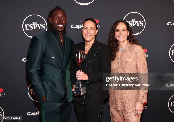 Jrue Holiday, Lauren Holiday and Sue Bird at The 2023 ESPYS held at Dolby Theatre on July 12, 2023 in Los Angeles, California.