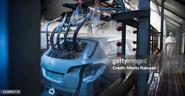 car bodies being cleaned prior to spraying in car factory - clean car interior stock pictures, royalty-free photos & images