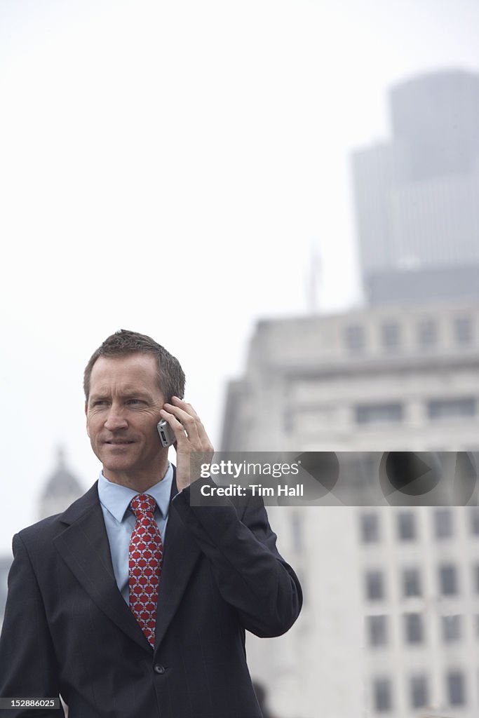 Businessman talking on cell phone