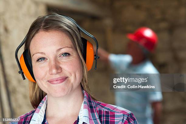 construction worker wearing headphones - ear defenders stock pictures, royalty-free photos & images