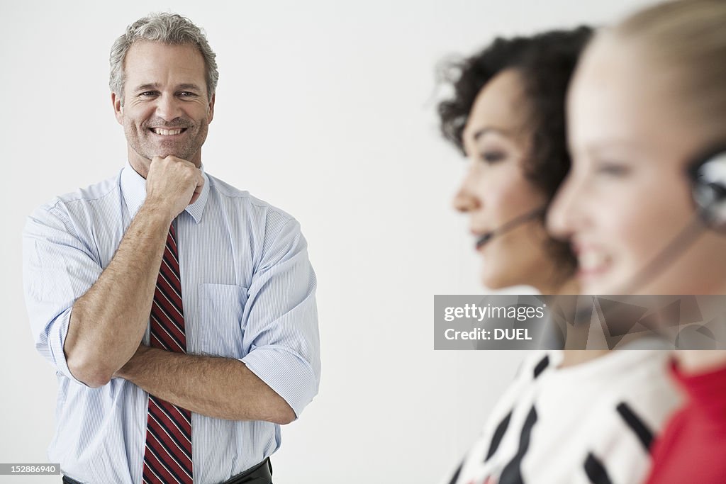 Businesswomen wearing headsets
