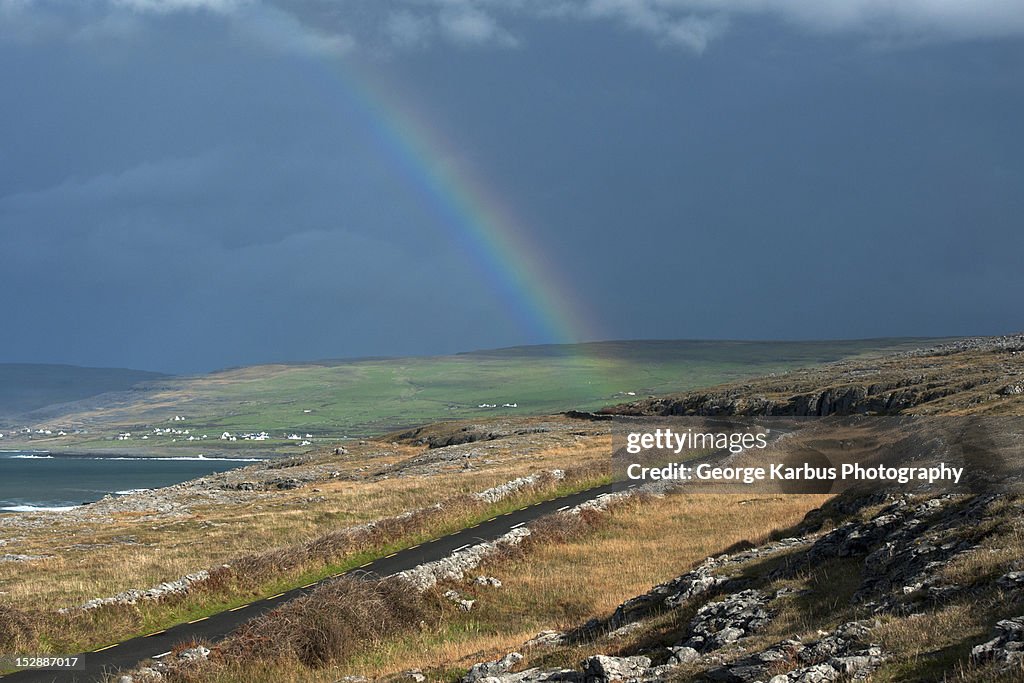 Rainbow over rural landscape