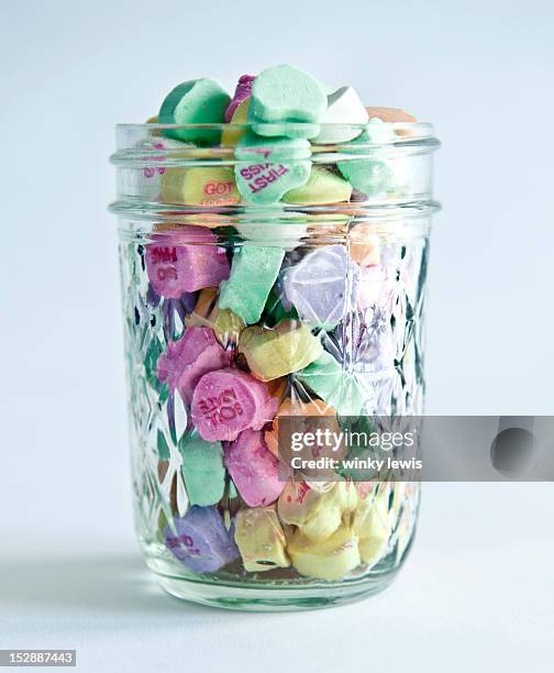 a jar of candy hearts - sweet jar stock pictures, royalty-free photos & images