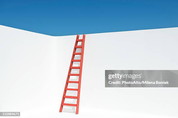 ladder leaning against wall - ladder leaning stock pictures, royalty-free photos & images