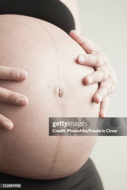 pregnant woman's belly - stretch mark stock pictures, royalty-free photos & images