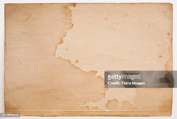 old grungy paper - stained stock pictures, royalty-free photos & images