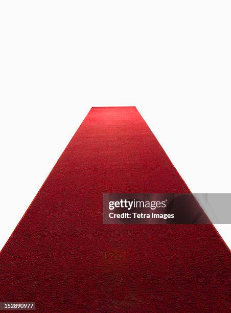 studio shot of red carpet - レッドカーペット ストックフォトと画像