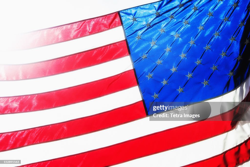 USA, New York City, American flag in bright sunshine