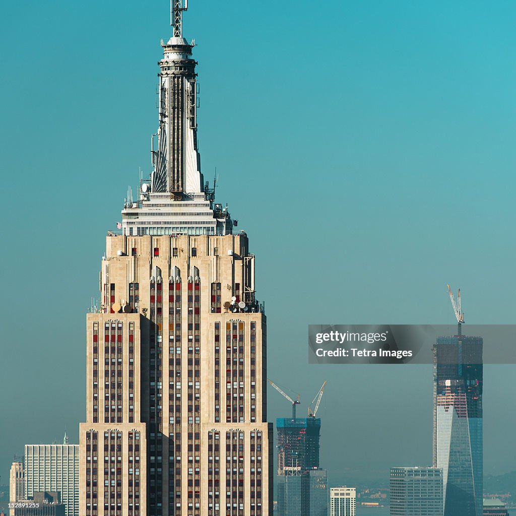 USA, New York City, Empire State Building with Manhattan skyline in background