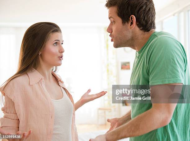 usa, new jersey, jersey city, young couple arguing - couple fighting stock pictures, royalty-free photos & images