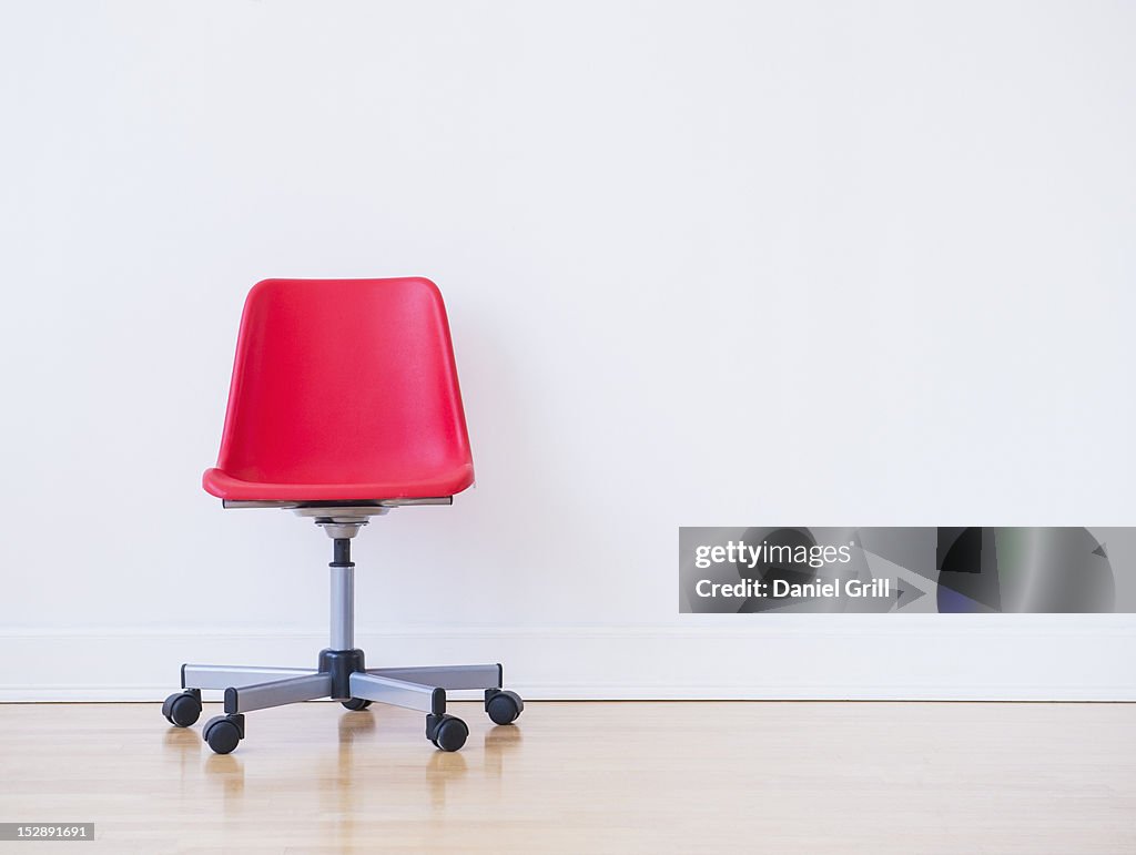 Studio shot of red office chair