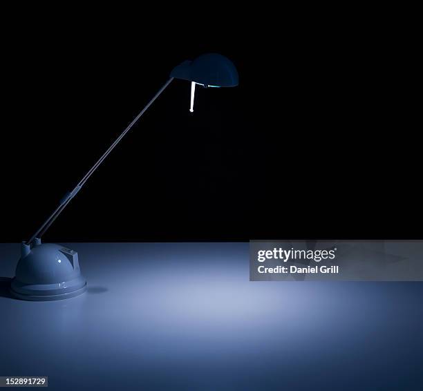 studio shot of desk lamp - schreibtischlampe stock-fotos und bilder