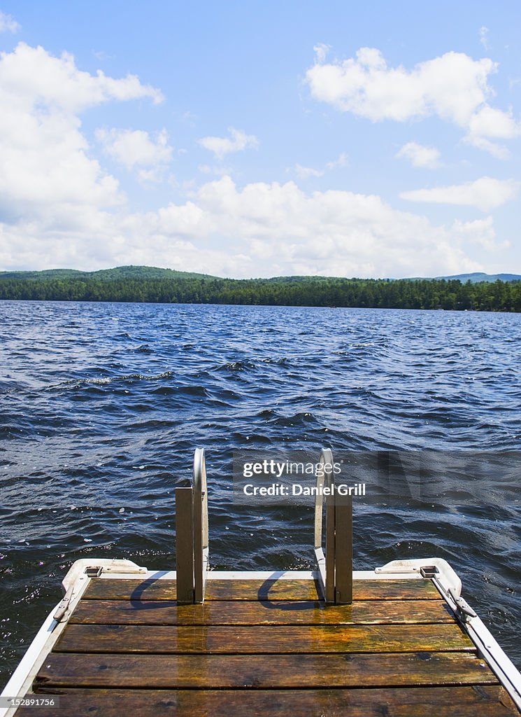 USA, Maine, Camden, View of lake with wooden jetty