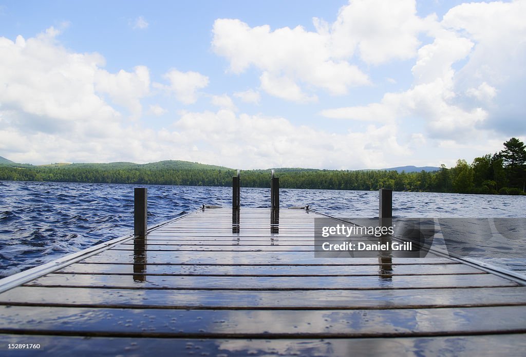 USA, Maine, Camden, View of lake with wooden jetty