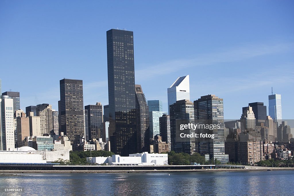 USA, New York City, Skyline against blue sky