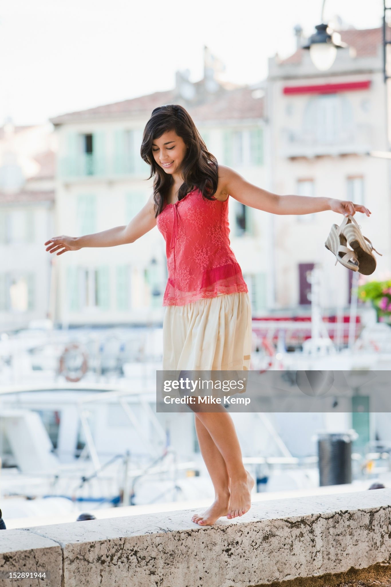 https://media.gettyimages.com/id/152891944/photo/france-cassis-young-woman-balancing-on-stone-wall.jpg?s=2048x2048&amp;w=gi&amp;k=20&amp;c=_OAUNkIS8XEQO4_2_sNWmaOdHur8Gh-XKGqBPgztWCE=