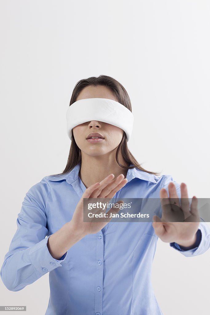 Studio Shot Of Woman Wearing Blindfold High Res Stock Photo Getty Images studio-shot-of-woman-wearing-blindfold-high-res-stock-photo-getty-images