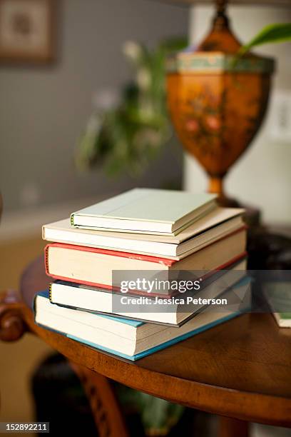 usa, utah, salt lake, stack of books on table - book on table stock pictures, royalty-free photos & images