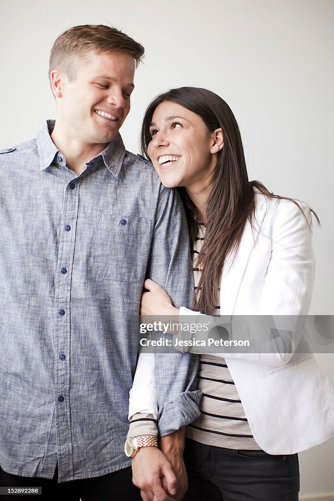 Portrait of young couple, studio shot