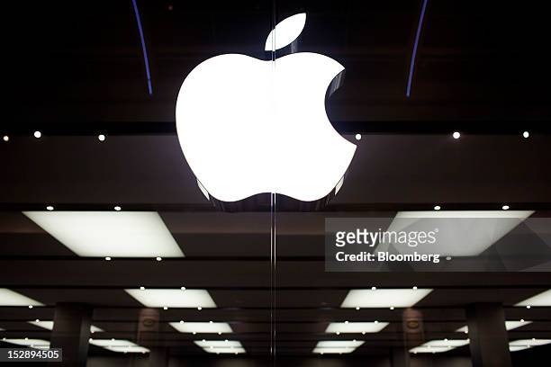The Apple Inc logo sits on display at the company's store in the Gran Plaza 2 shopping mall in Majadahonda, near Madrid, Spain, on Friday, Sept. 28,...