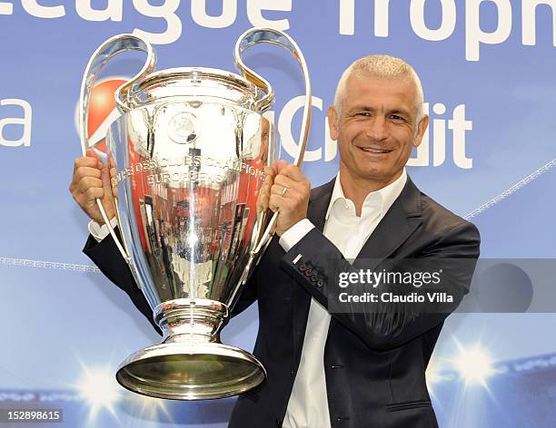 Fabrizio Ravanelli poses with the trophy during the UEFA Champions League Trophy Tour 2012/13 on September 28, 2012 in Bologna, Italy.