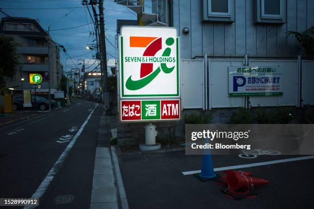 Signage for a 7-Eleven convenience store, operated by Seven & i Holdings Co., in Tokyo, Japan, on Wednesday, July 12, 2023. Seven & i Holdings will...