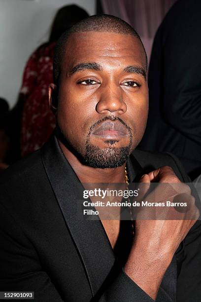 Kanye West attends the Christian Dior Spring / Summer 2013 show as part of Paris Fashion Week on September 28, 2012 in Paris, France.