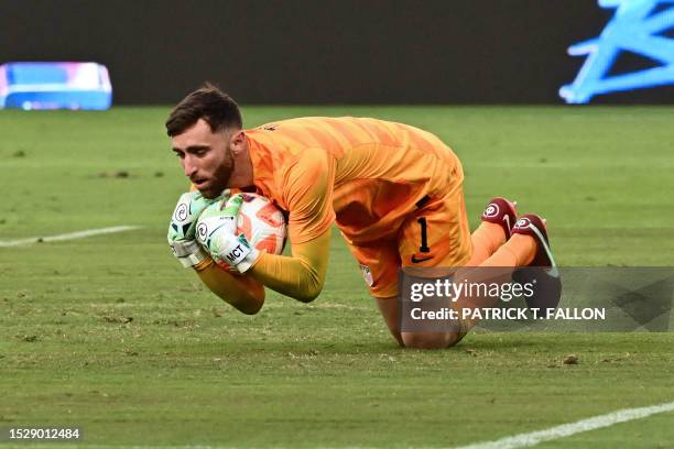 S goalkeeper Matthew Turner stops the ball during the Concacaf 2023 Gold Cup semifinal football match between Panama and USA at Snapdragon Stadium in...