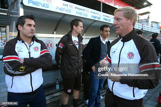 Interimscoaches Thomas Meggle of St. Pauli looks on with Timo Schultz prior the Second Bundesliga match between Jahn Regensburg and FC St. Pauli at...