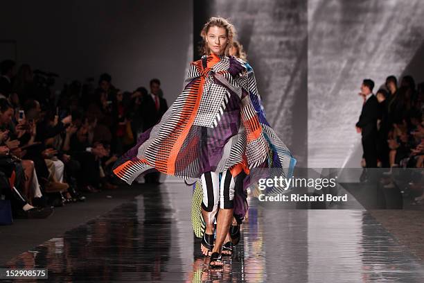 Models walk the runway during the Issey Miyake Spring / Summer 2013 show as part of Paris Fashion Week at Grand Palais on September 28, 2012 in...