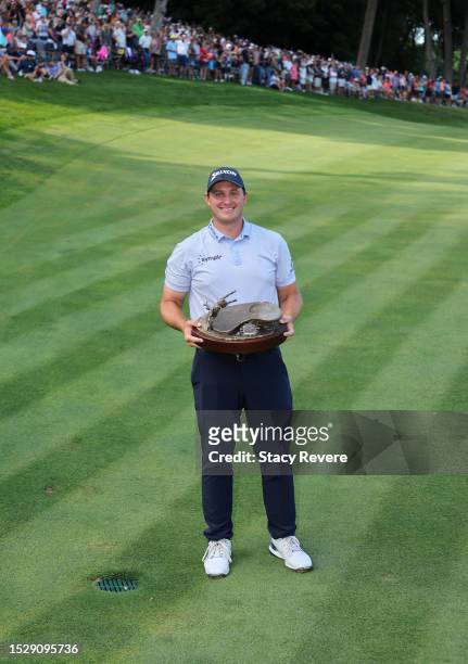 Sepp Straka of Austria poses with the trophy after winning the John Deere Classic at TPC Deere Run on July 09, 2023 in Silvis, Illinois.