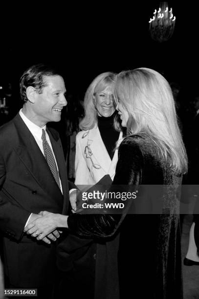 Michael Ovitz, Judy Ovitz, and Kim Basinger attend an event at the Bruin and Village theaters in the Westwood neighborhood of Los Angeles,...