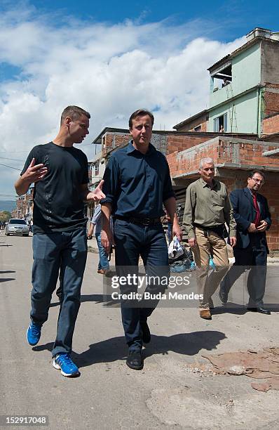 David Cameron, Prime Minister of Great Britain during an official visit to Luta Pela Peaz Project at Complexo da Mare on September 28, 2012 in Rio De...