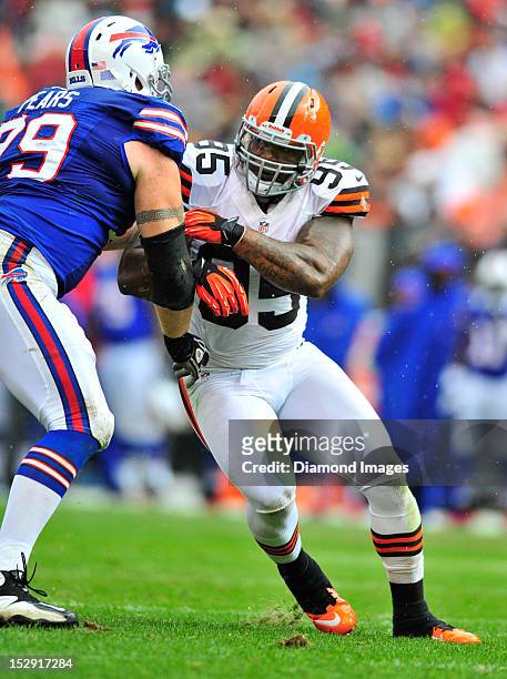 Defensive linemen Juqua Parker of the Cleveland Browns rushes the passer during a game with the Buffalo Bills at Cleveland Browns Stadium in...
