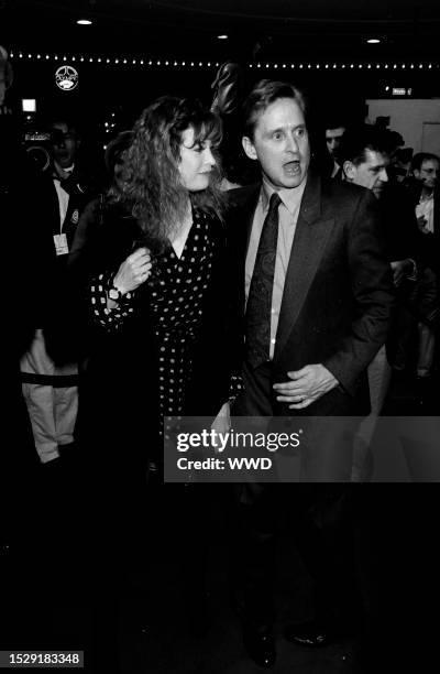 Diandra Luker and Michael Douglas attend an event at the Bruin Theater in the Westwood neighborhood of Los Angeles, California, on November 28, 1994.
