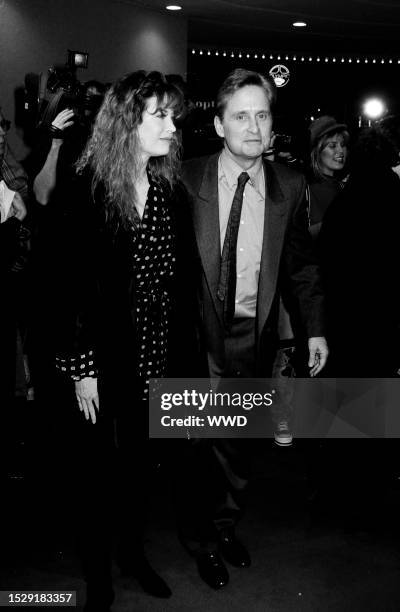 Diandra Luker and Michael Douglas attend an event at the Bruin Theater in the Westwood neighborhood of Los Angeles, California, on November 28, 1994.