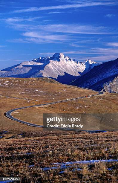 cars head home on the trail ridge road in the rocky mountains national park. - trail ridge road colorado stock-fotos und bilder