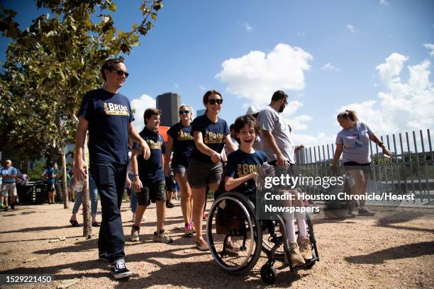 The Bruen family, Jason Bruen Ryder Bruen Heather Bruen and Kai Bruen join their community and walk to end to end hydrocephalus on Saturday, Sept. 21...