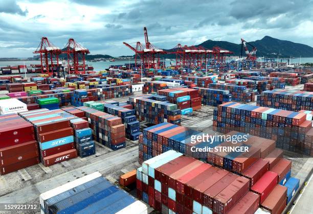 Containers are seen at the container terminal of Lianyungang Port, in China's eastern Jiangsu province on July 13, 2023. / China OUT