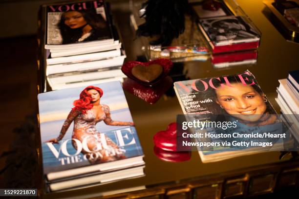 Andrea Bonner's collection of Vogue magazines including the autographed cover of supermodel Beverly Ann Johnson who was the first African-American...