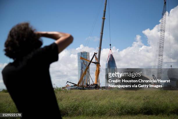 Austin Barnard photographs the SpaceX Starship spaceship prototype in Boca Chica Beach on Friday, Sept. 27, 2019. Barnard became part of the space...