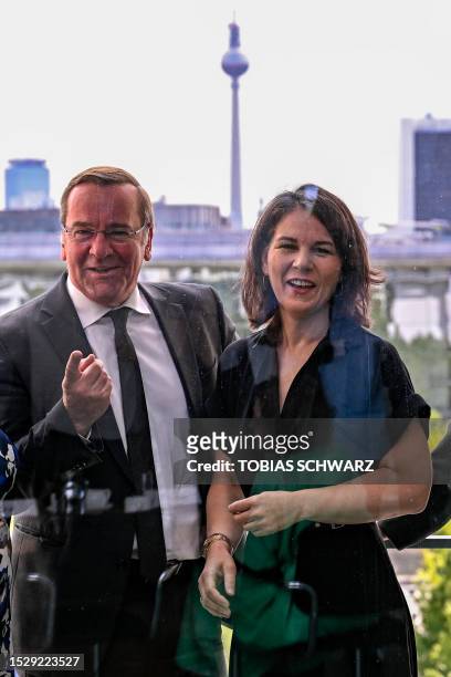 German Defence Minister Boris Pistorius and German Foreign Minister Annalena Baerbock are pictured on the balcony prior the weekly meeting of the...