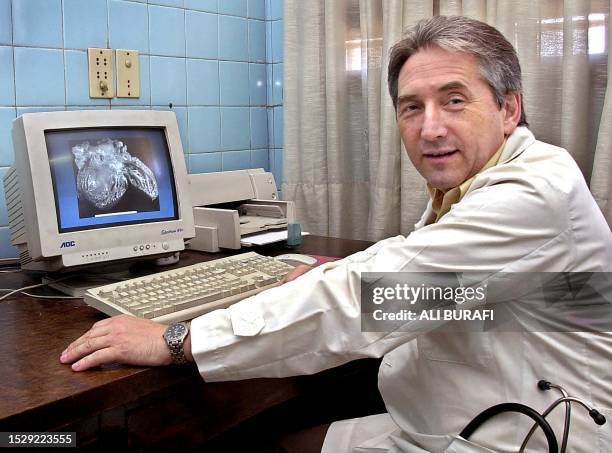 Daniel Pineiro, cardiologist, works at a hospital in Buenos Aires, Argentina, 02 February 2002. Argentinian middle class has been seriously affected...