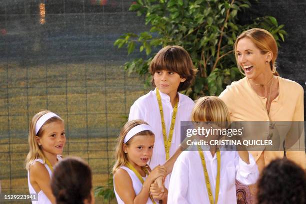 Spanish singer Julio Iglesias's wife Miranda and children are pictured during a concert of his world tour marking the 40th anniversary of his musical...