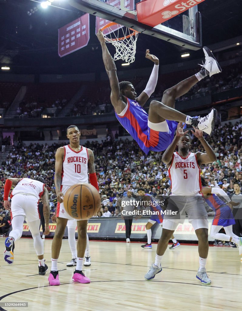 Darius Days Rockets Card Jalen Duren of the Detroit Pistons dunks against Darius Days of the ...