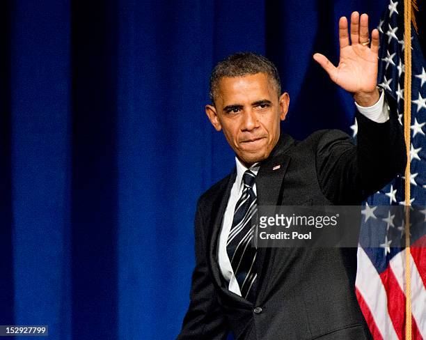 President Barack Obama waves during a fundraiser event at the Capital Hilton Hotel September 28, 2012 in Washington, DC. Obama will reportedly speak...