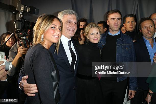 Sidney Toledano, Melanie Laurent and Head Creative Director at Dior, Raf Simons attend the Christian Dior Spring/Summer 2013 show as part of Paris...