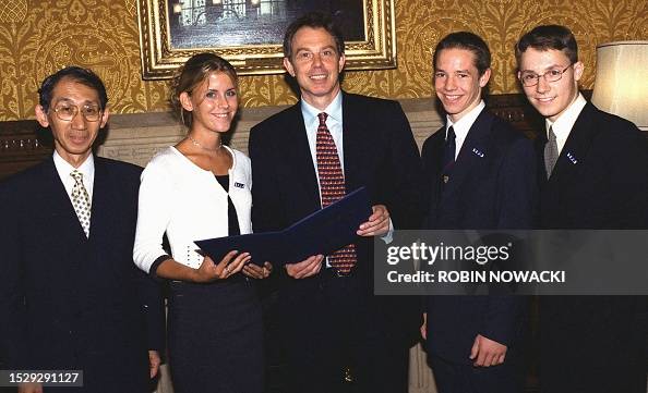 Britain's Prime Minister Tony Blair meets British members from the G8