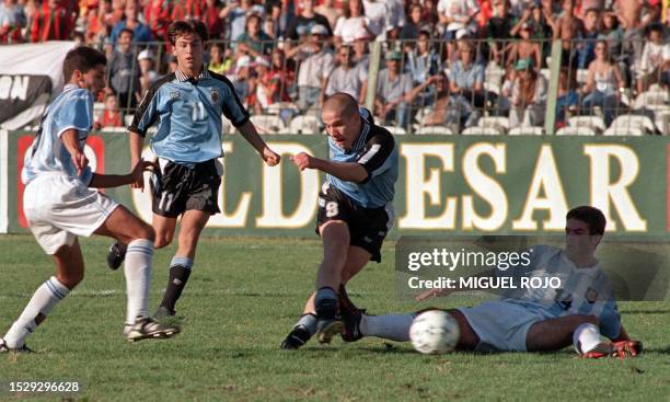 Player for the under-17 Uruguayan soccer team, Mario Leguizamon, scores a second goal in the match against Argentina, 21 March, 1999 in Montevideo,...