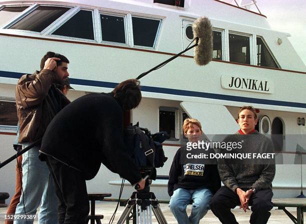 Actors Freddie Sayers , playing Prince William and Rory Jennings, playing Prince Harry, dunring an interview, in front of the "dodi's boat" before...